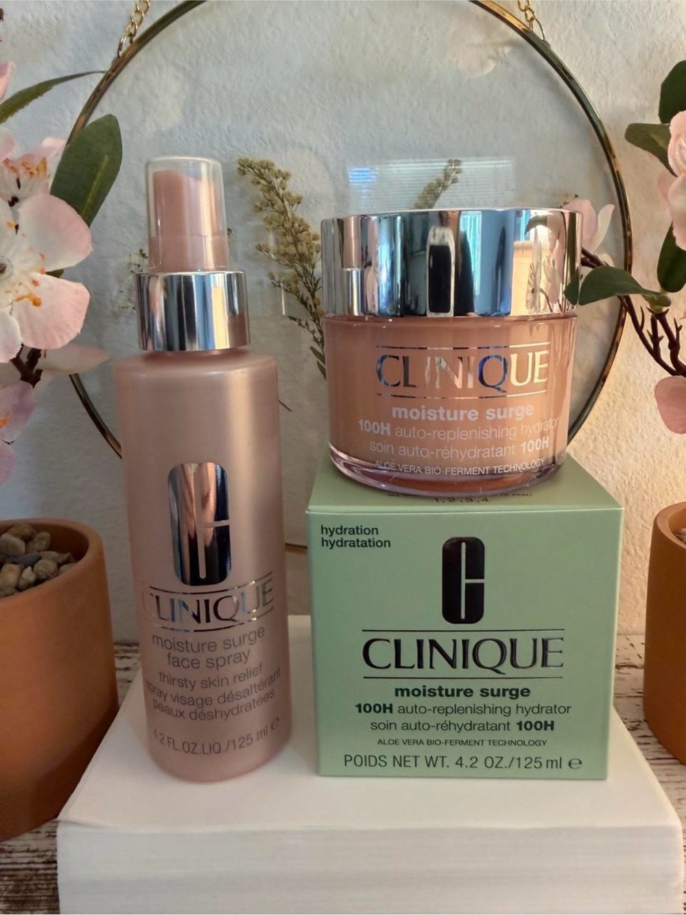Clinique Moisture Surge Set facial spray & 4.2 oz moisturizer. Prices as a set